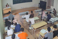 The teacher remove heels relax her tired feet under the desk 2