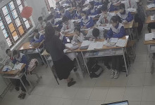 The teacher dangling shoeplay and dipping many times during class 24