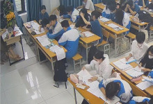 The teacher dangling shoeplay and dipping many times during class 33