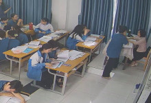 The teacher dangling shoeplay and dipping many times during class 41