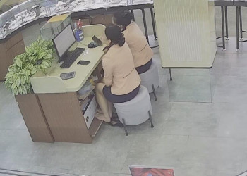 The jewelry store hostess bare feet dangling shoeplay