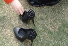 One of the girl say throw your heels into the river