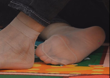 The lady show us her cute sole 13