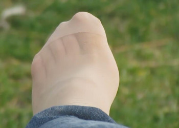 The beautiful girl took off her high heels and relaxed her feet 9