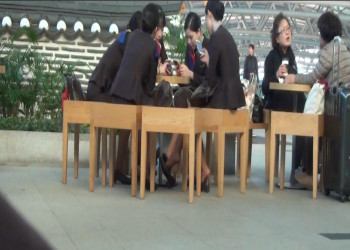 Air-line hostress have a meeting ,and group of shoeplay dangling been catched!