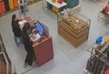 The bag shop hostess stand up dipping shoeplay behind the desk