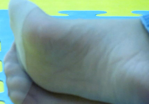 The beautiful girl took off her high heels and relaxed her feet 2