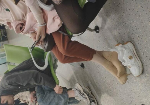 The lady remove heels relax her sexy nylon feet waiting for a call at the hospital 8