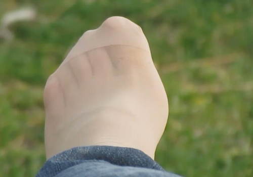 The beautiful girl took off her high heels and relaxed her feet 9