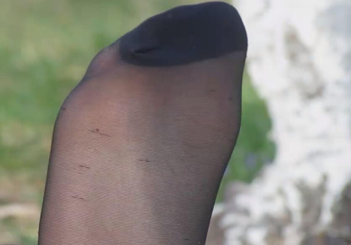 The beautiful girl took off her high heels and relaxed her feet 12