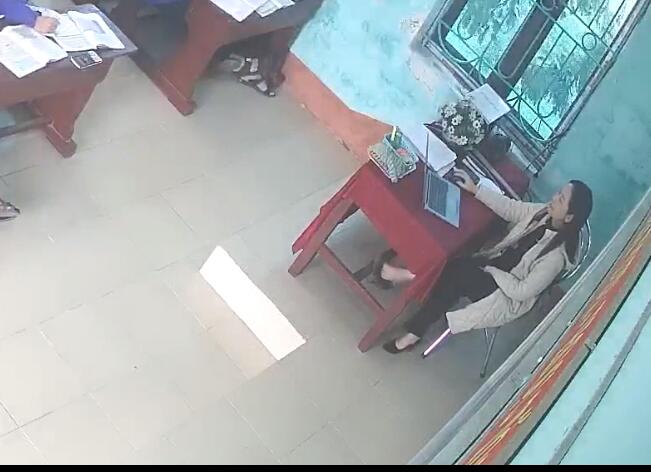 The teacher dangling heels with her toes 2