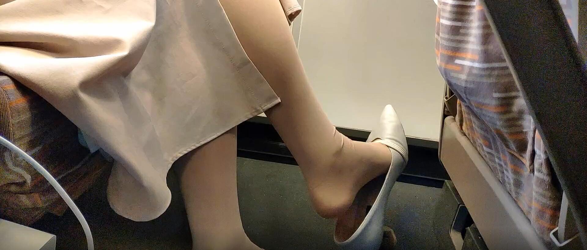 Catch the near by girl dangling shoeplay on the train 2