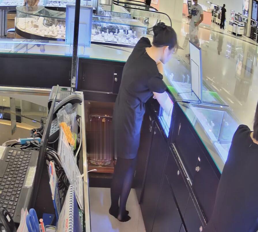 The jewelry store hostess in black nylon show us her cute feet! 154