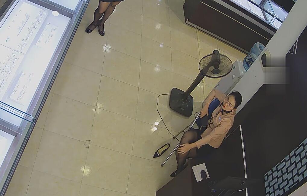 The jewelry store hostess in black nylon dangling and drop