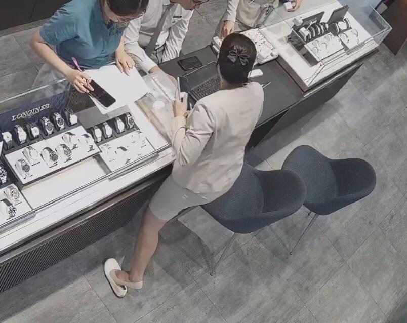 The jewelry store hostess in white dress and white heels sit down shoeplay 13