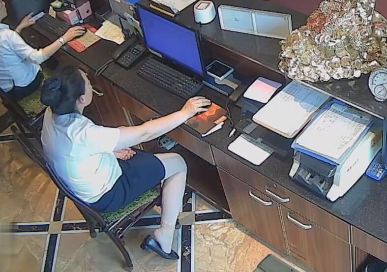 The hotel receptionist in nylon great dangling dipping and shoeplay