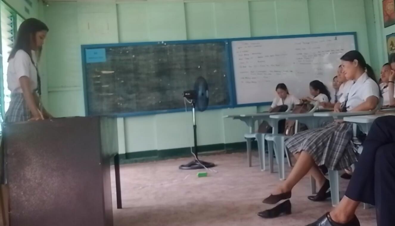 The student remove heels and show us her feet in class